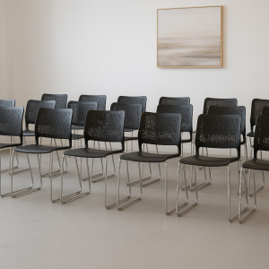 Carla stacking chair with armrests